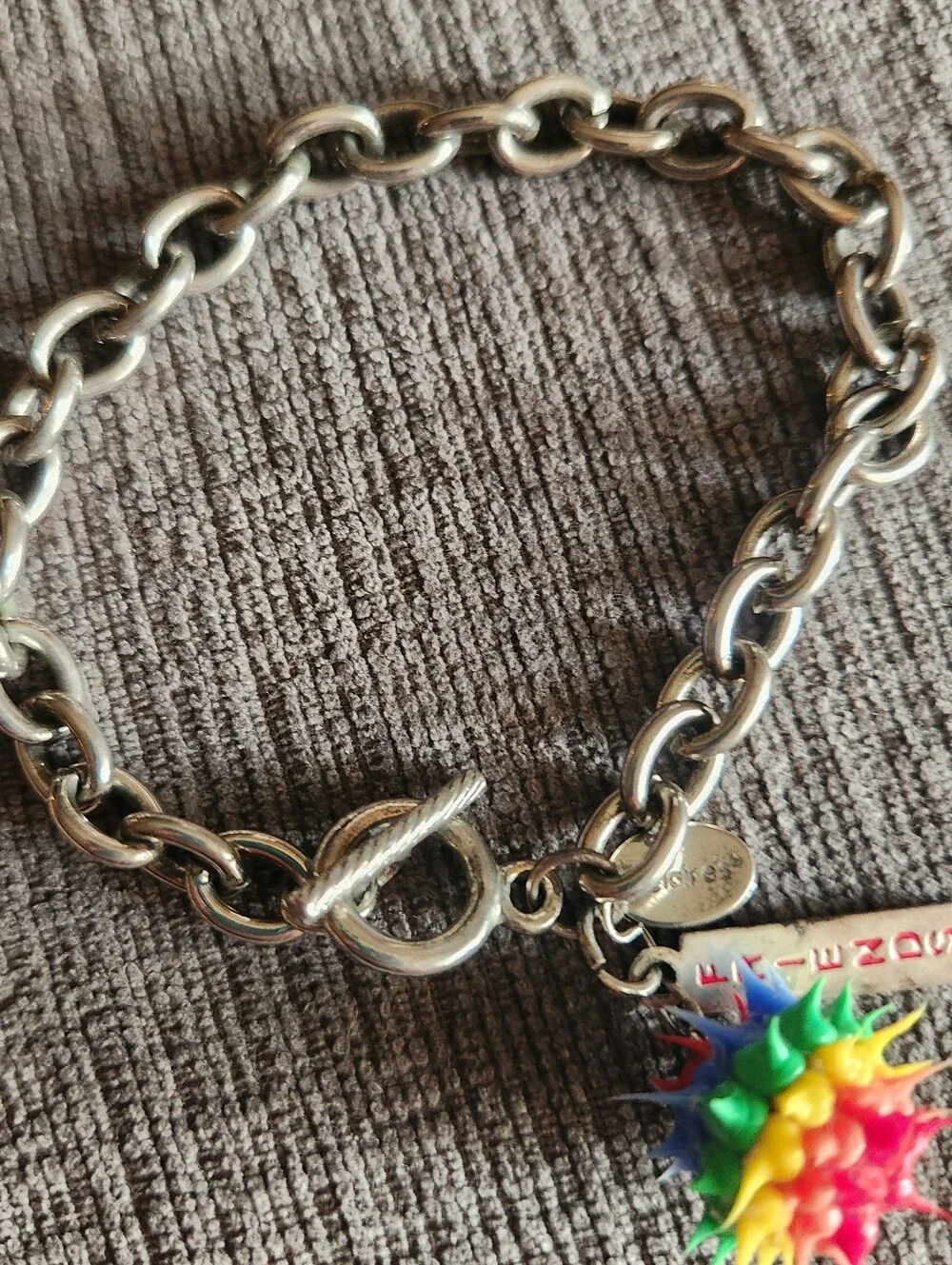 Claire's Silver Chain Bracelet with Rainbow Spike Charm and FRIENDS Tag